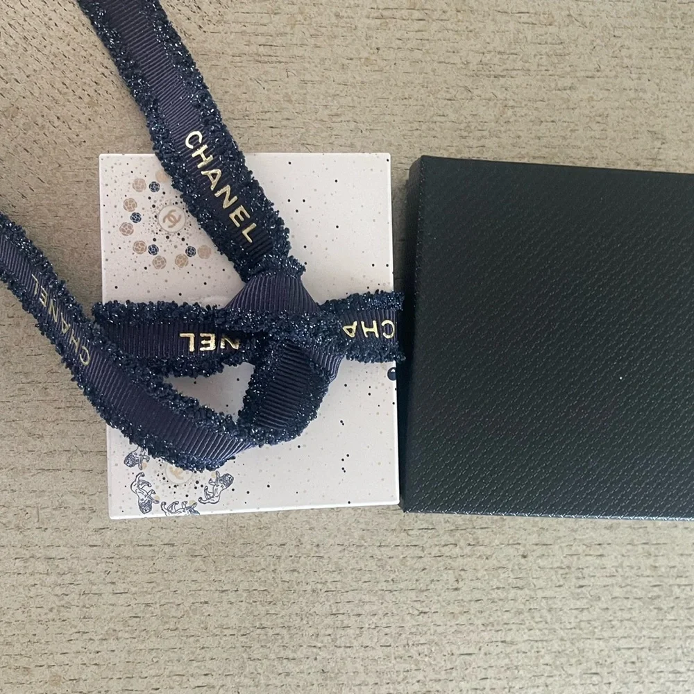 Chanel Holiday Fragrance Charm With Gold and Pearl Necklace